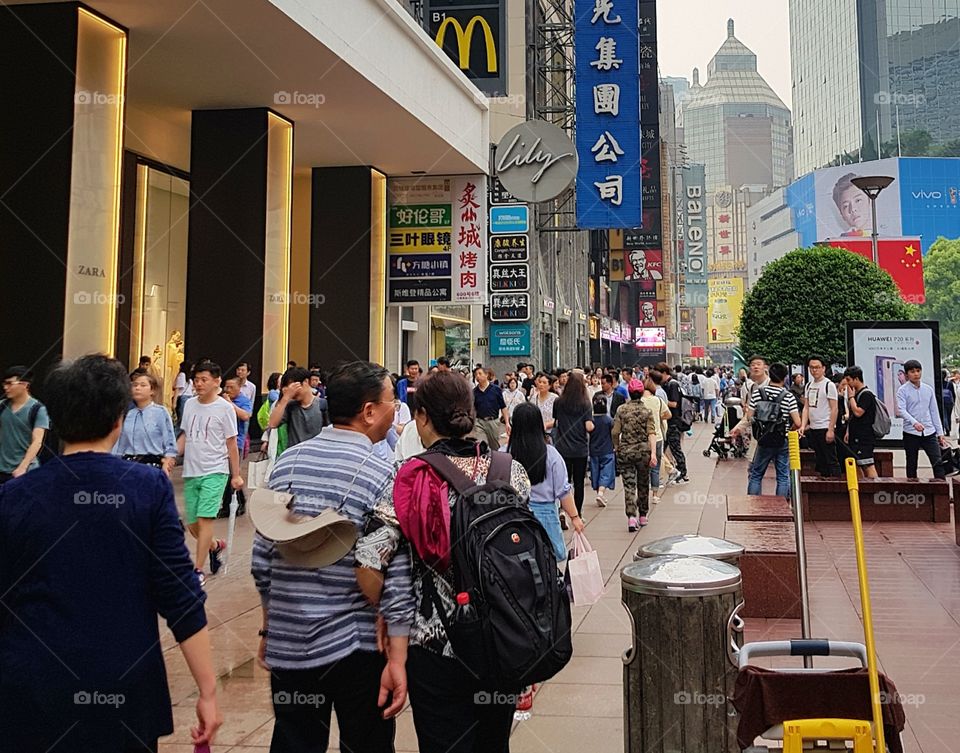 Shanghai's busy Nanjing Road on a Saturday afternoon.
