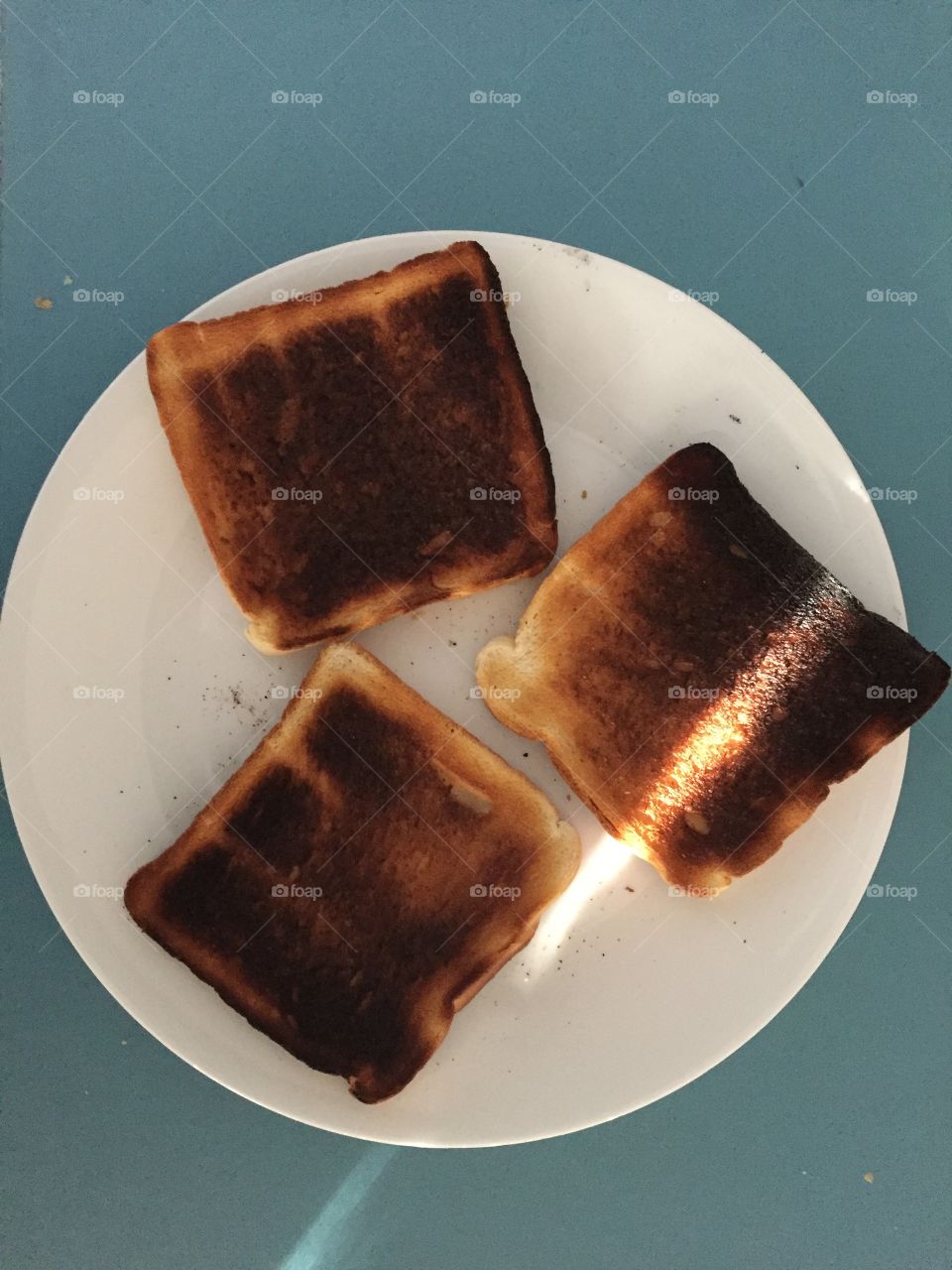 Burnt toast on plate