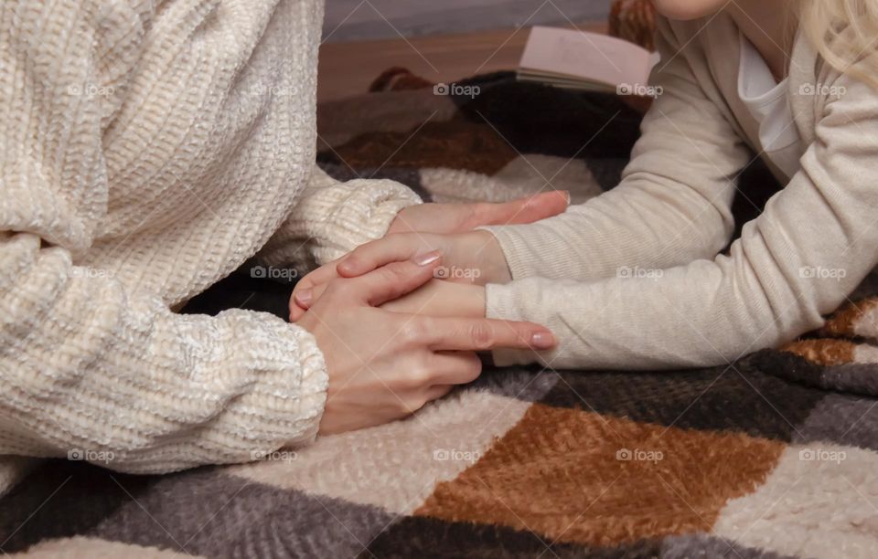 Mom hugging her daughter