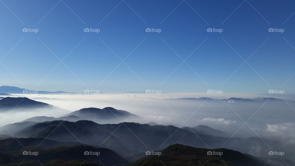 Clouds over mountain range