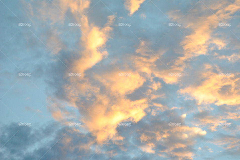 Clouds reflecting Sun
