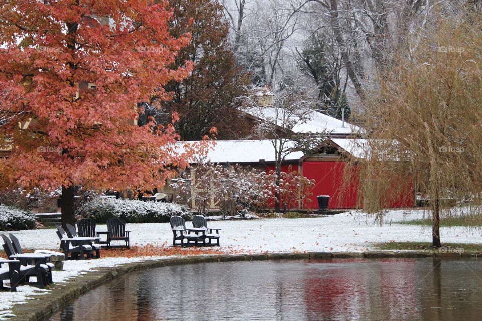 Snowy day with red barn