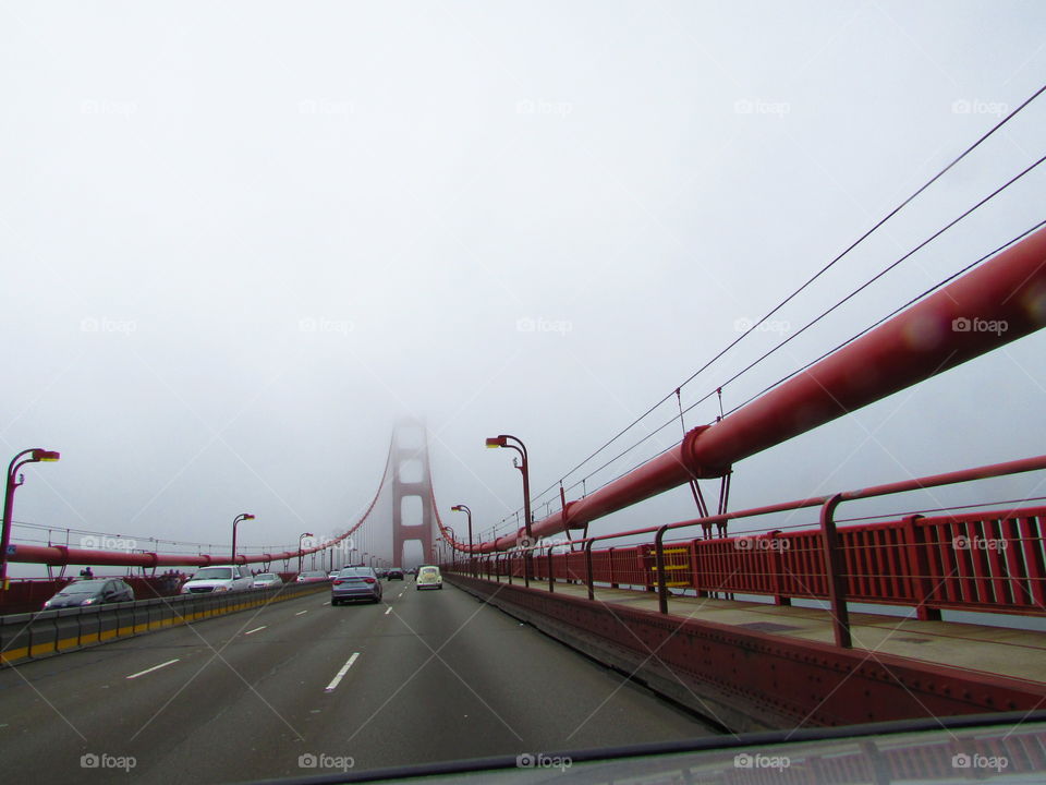 in the Mist driving on the Golden Gate Bridge
