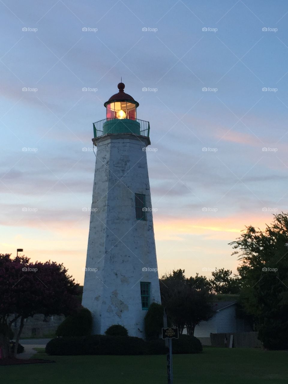 Old Point Comfort Lighthouse. The light still burns at one of the oldest lighthouses in the U.S.  At the setting of the sun it's light shines to all. 