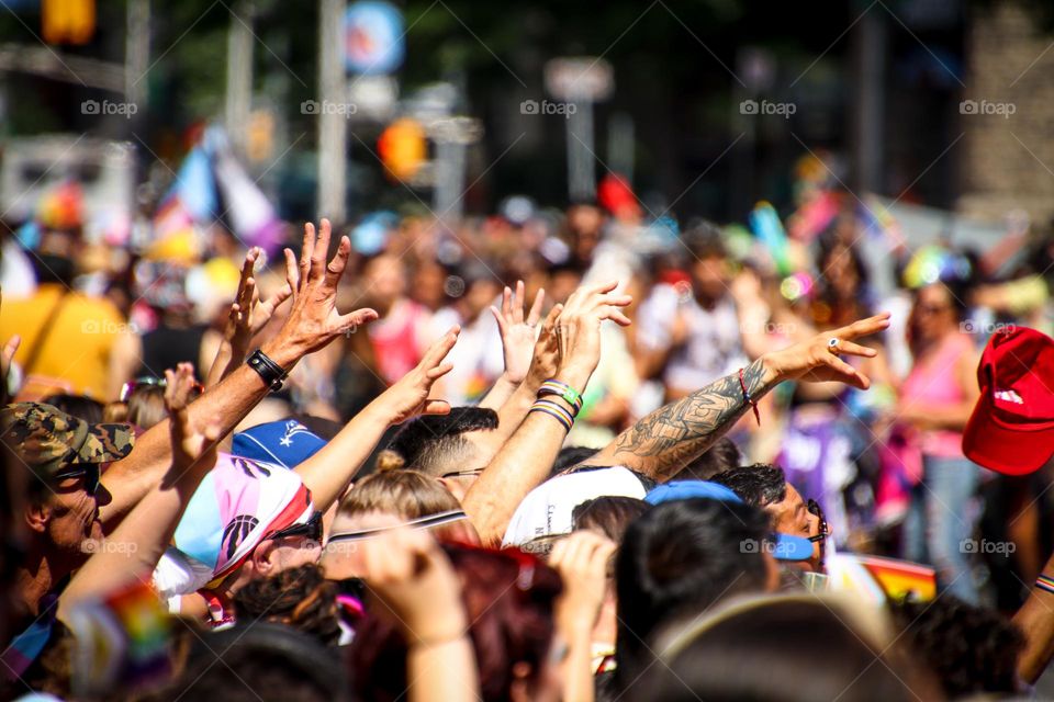 Hands of people in a crowd