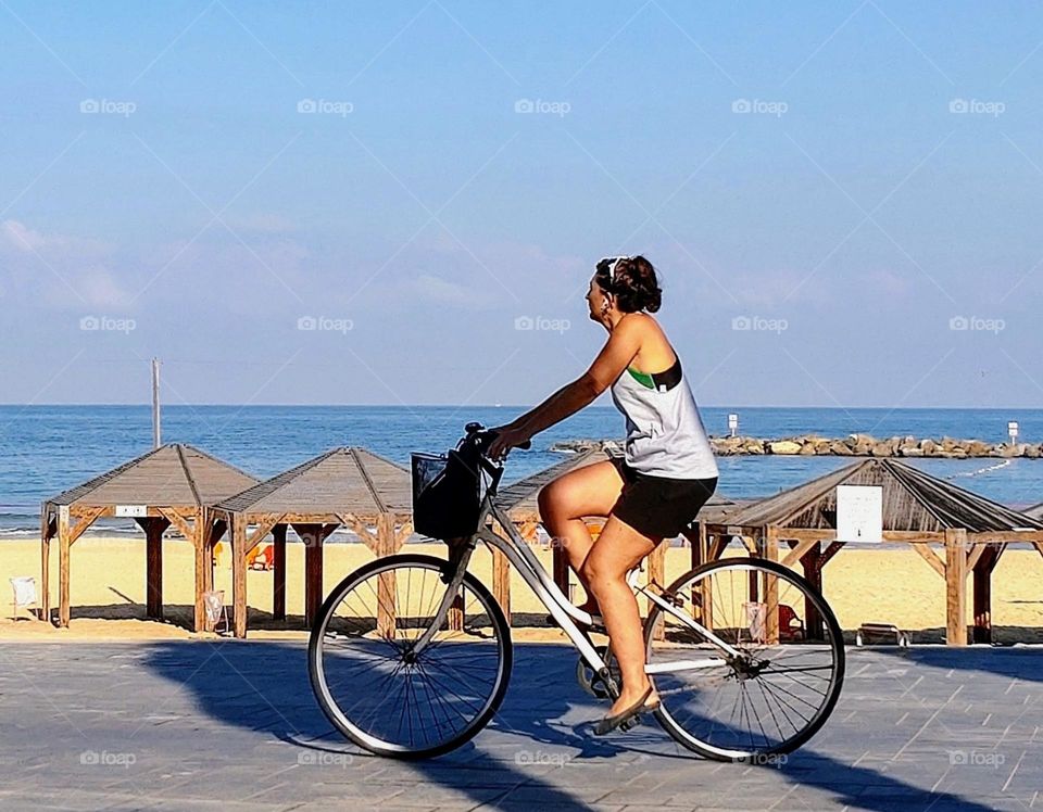 Mother on her morning ride on the bicycle🚴‍♀️