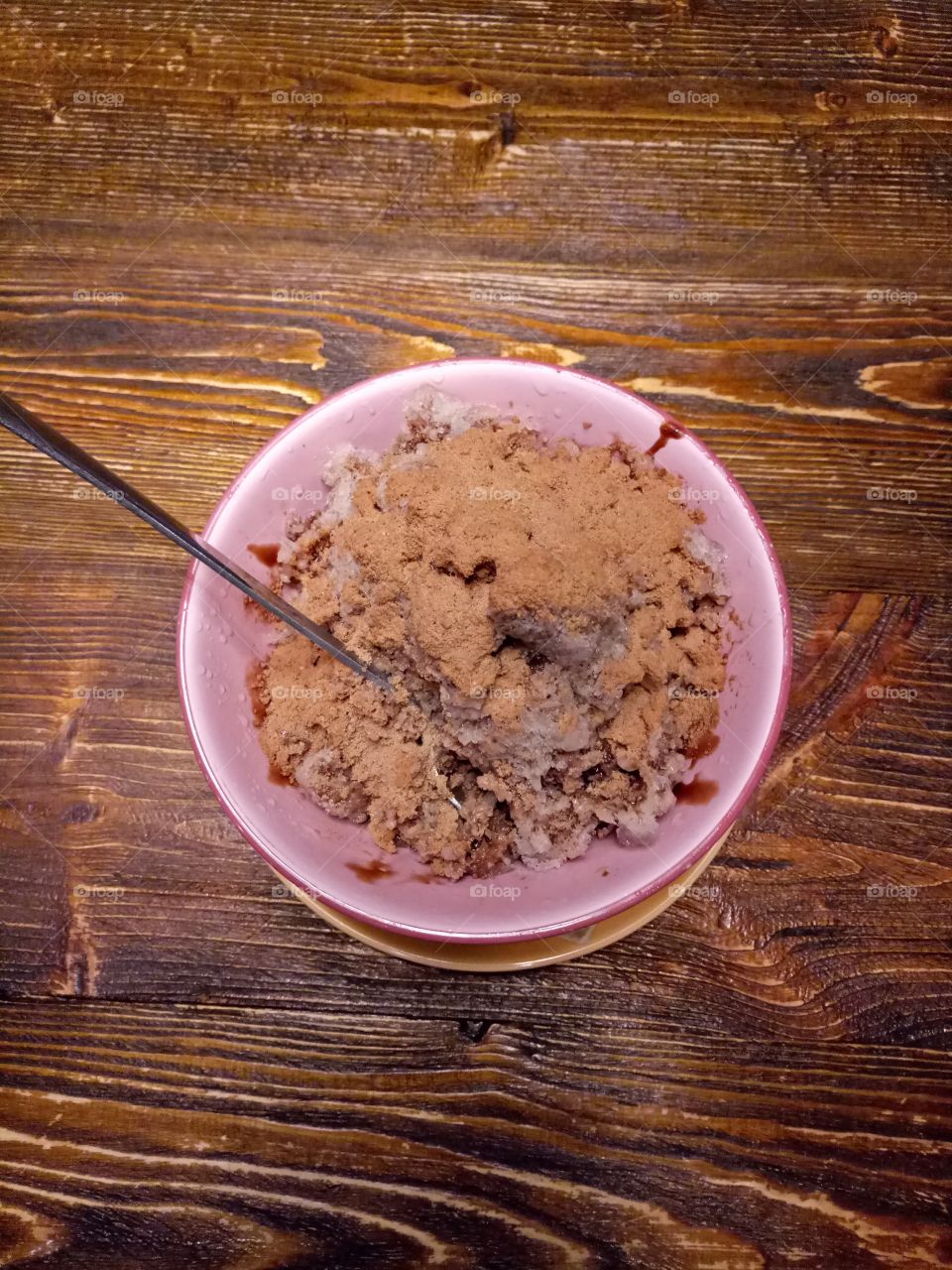 a bowl of chocolate ice during the day