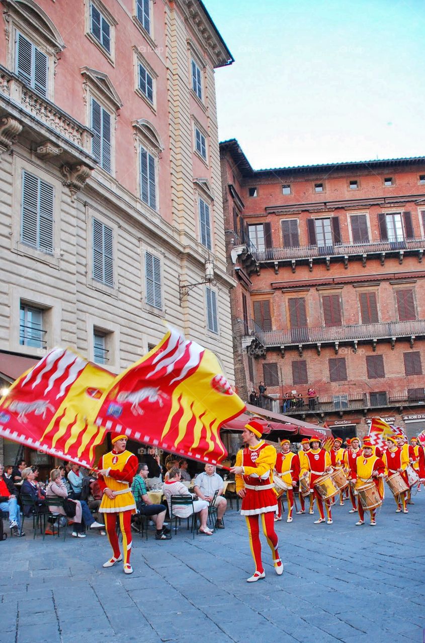 May Day in Sienna. A May Day pageant paraded through the piazza in Sienna Italy 