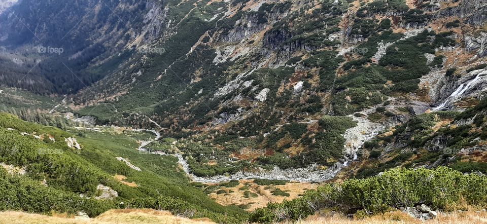 Waterfall and stream in the mountains