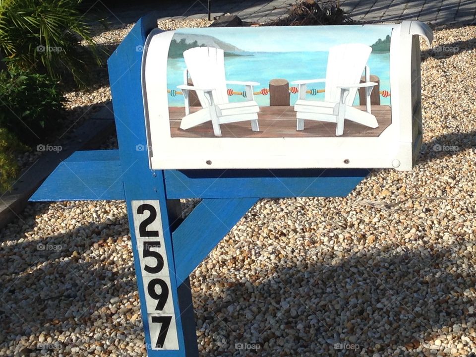 Mailbox with 2 chairs and house number