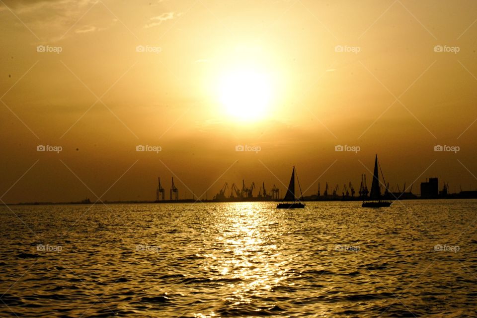 Sailing in the sunset. Sailing in summer day 
