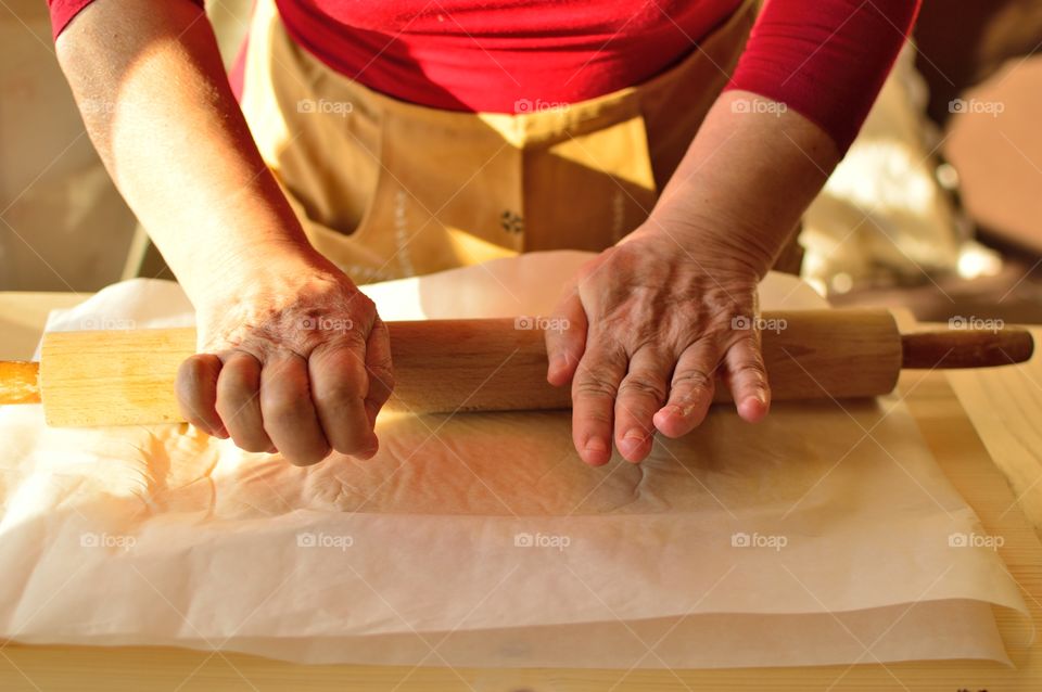 My grandmother who prepares the dough for biscuits