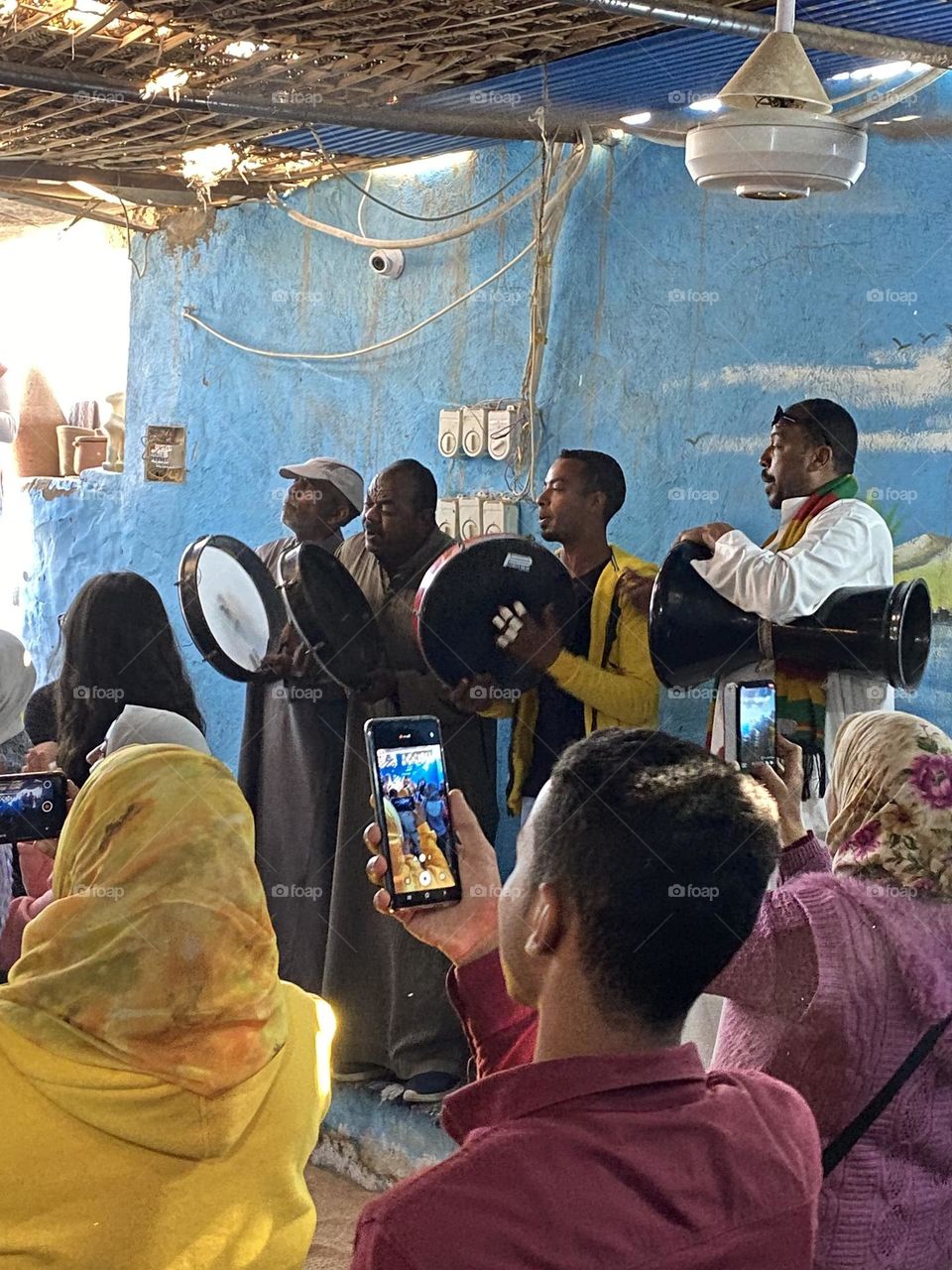 A boy is using his phone 