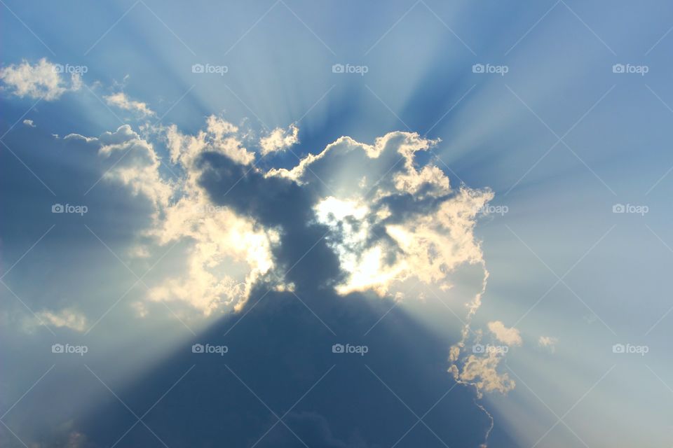 sun rays getting passed through clouds...