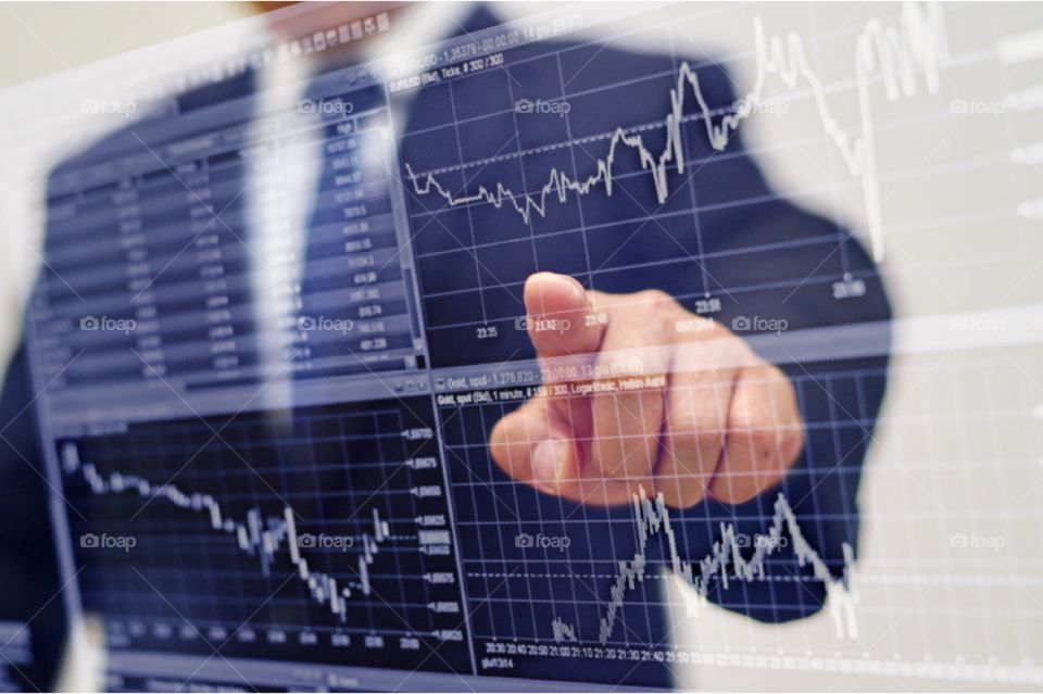 Business paperwork of analysis graph, charts and pie table, on desk with calculator and pen for stock investment or sales marketing or financial accounting concept 