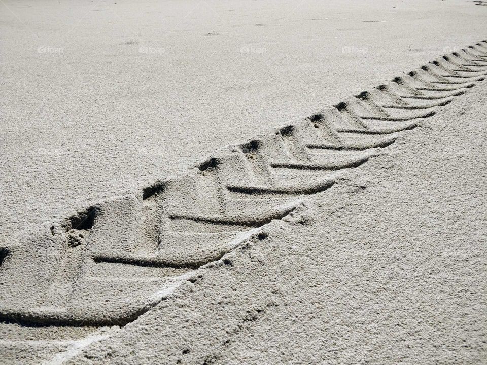 Track through the sand