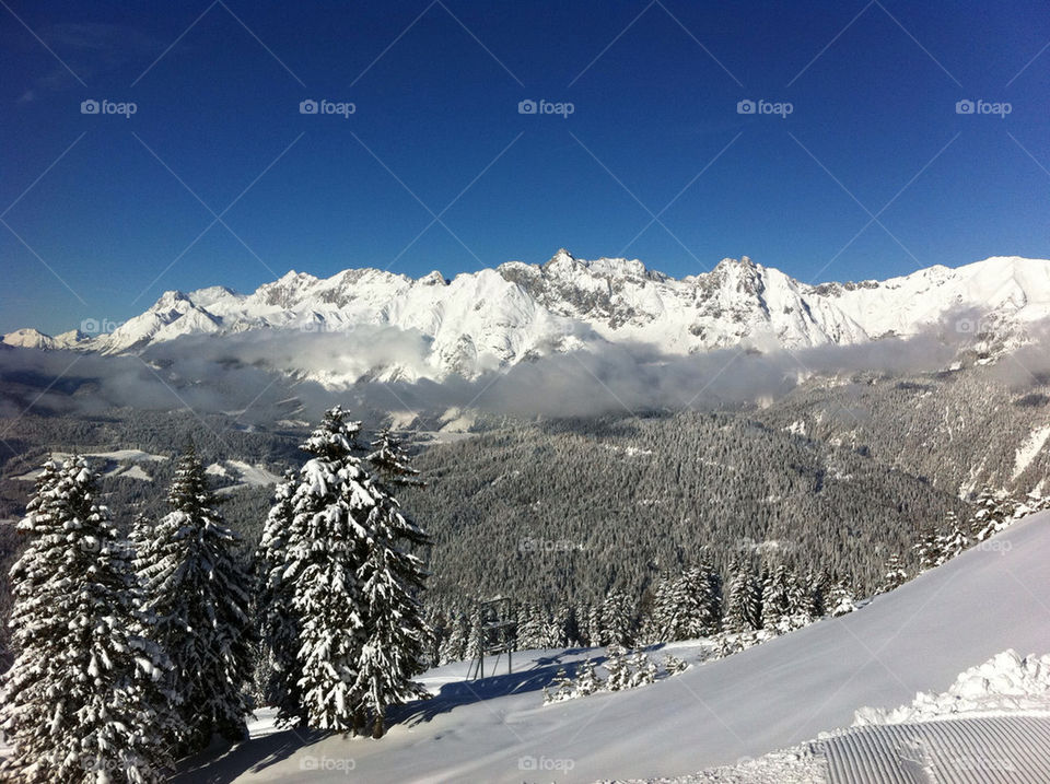 Scenic view of mountain against sky during winter