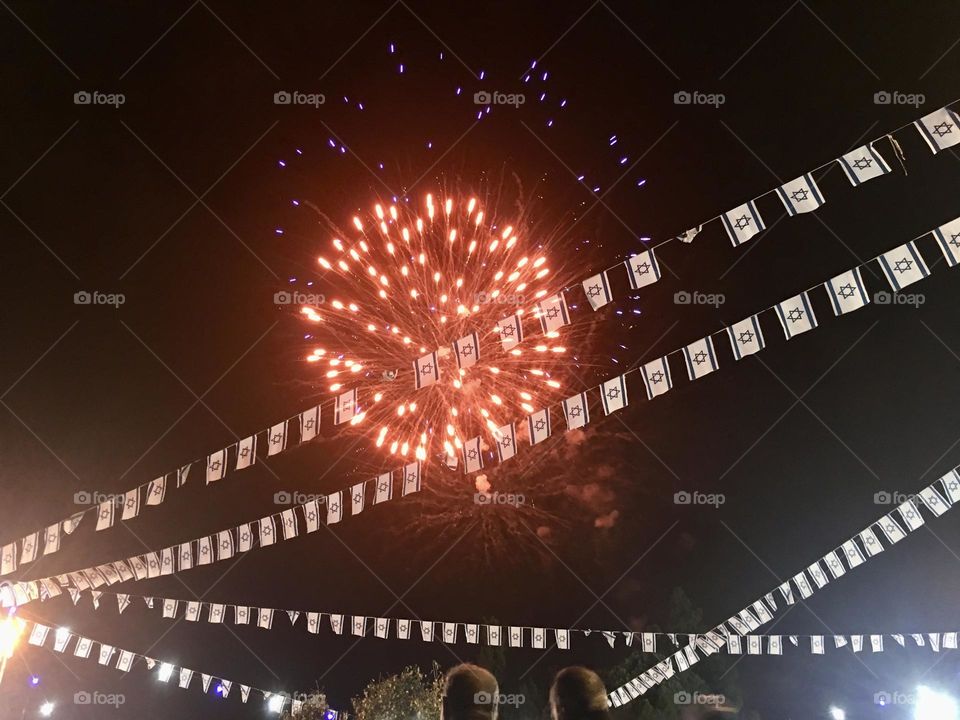 Fireworks and many little flags on Independence Day 