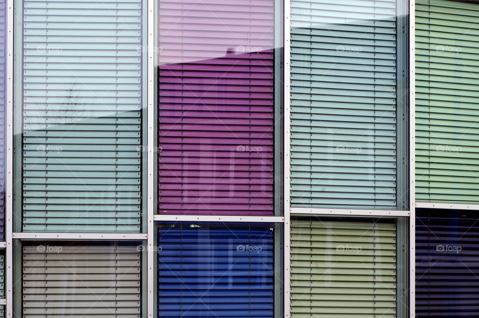 Full frame shot of multicolored shutters by day.