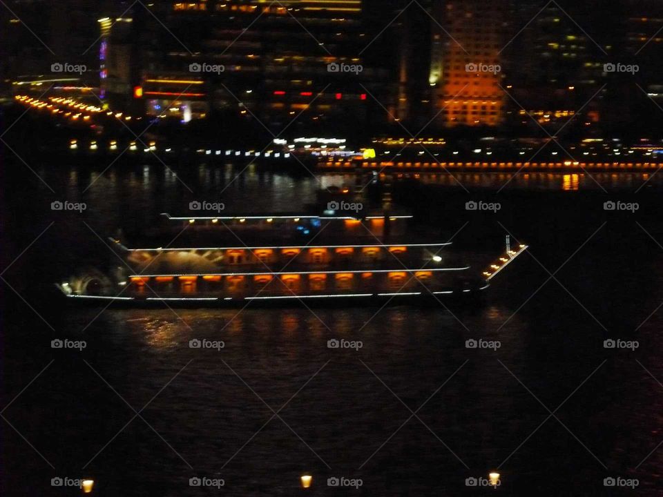 boat navigation. sailing on shangai river at night