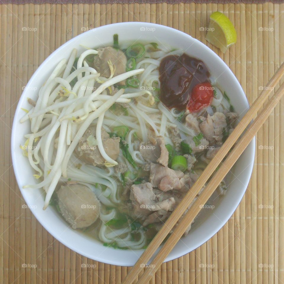 Pho Bo - Vietnamese noodles with beef broth. Home made Vietnamese noodles soup