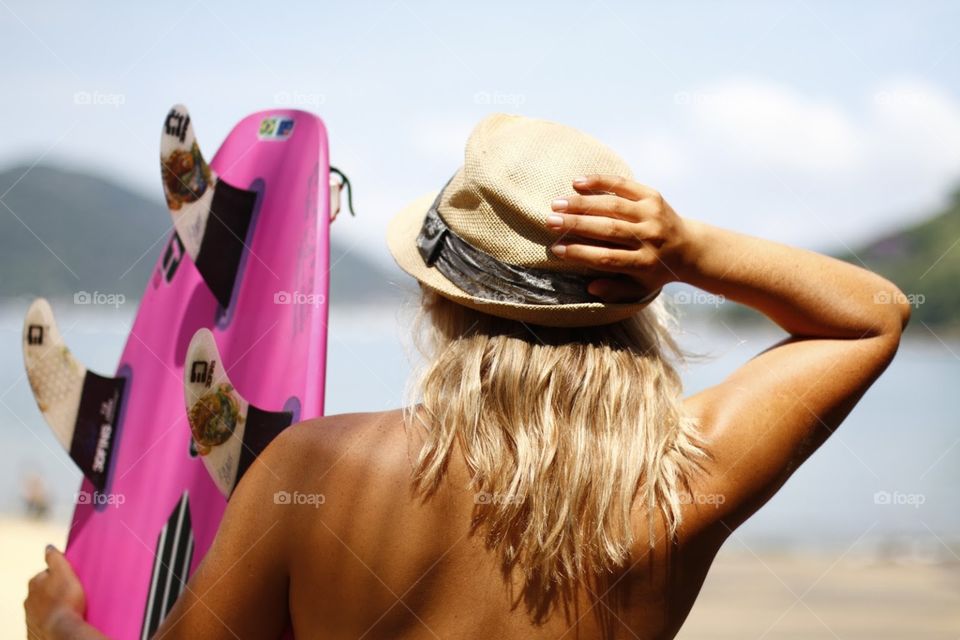 surfboard and hat