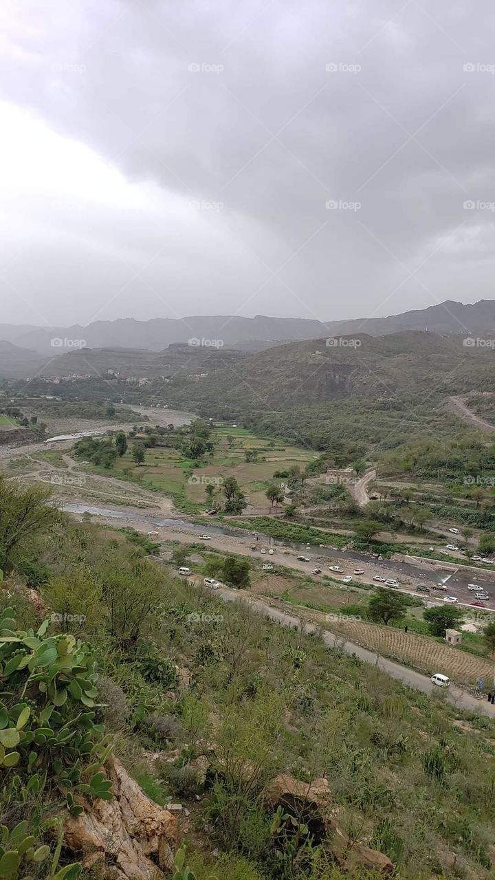 Glory be to God, the magnificent and picturesque view and the natural green trees are a view that is nothing more wonderful than it