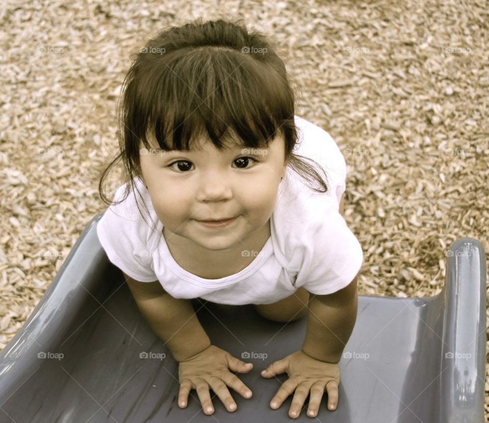 playing on the slide