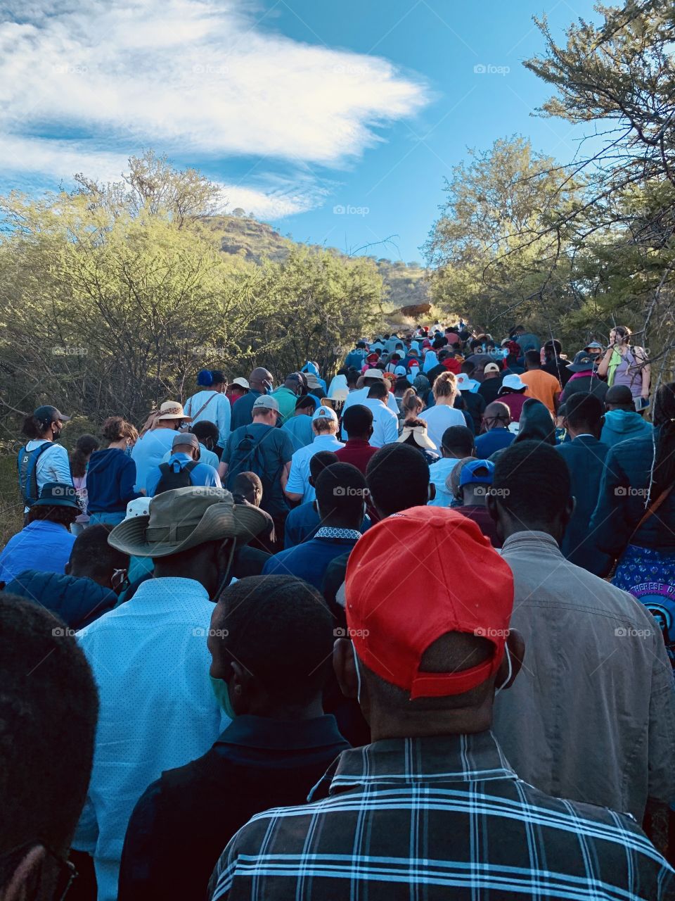 A crowd of pilgrims on a pilgrimage of the way of the cross on Good Friday. 