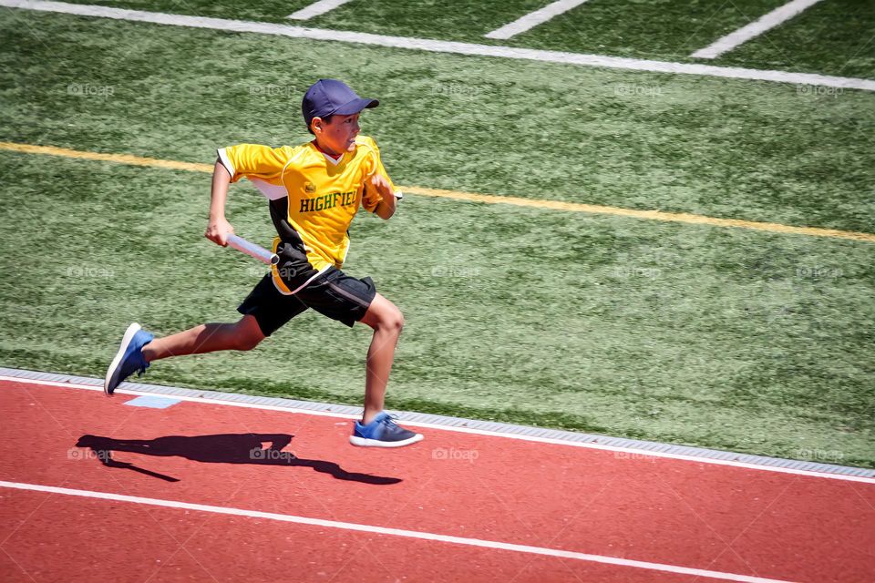 Boy is running raley race
