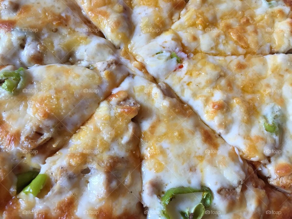 Homemade pizza with chicken and cheese