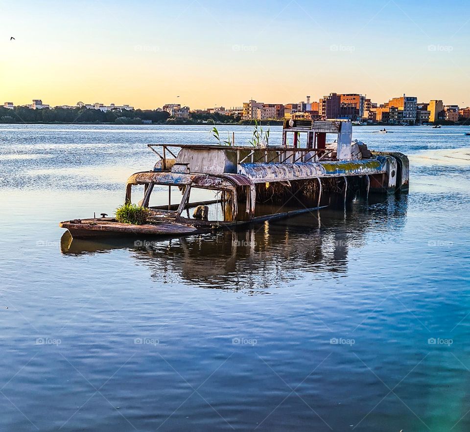 sunken boat in the lake
