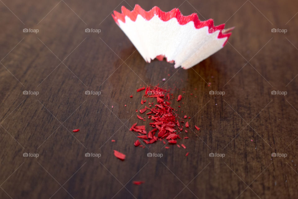 Red skirt from a colored pencil after sharpening 