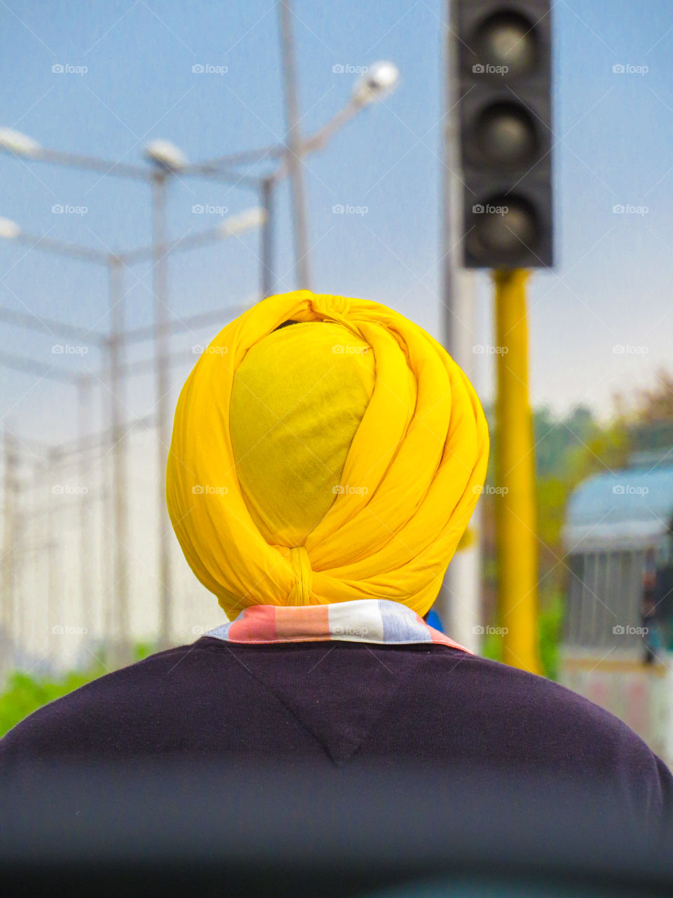 sardar wearing yellow turban