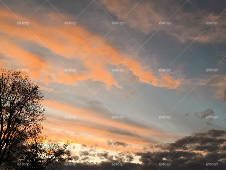 Orange and white fluffy clouds