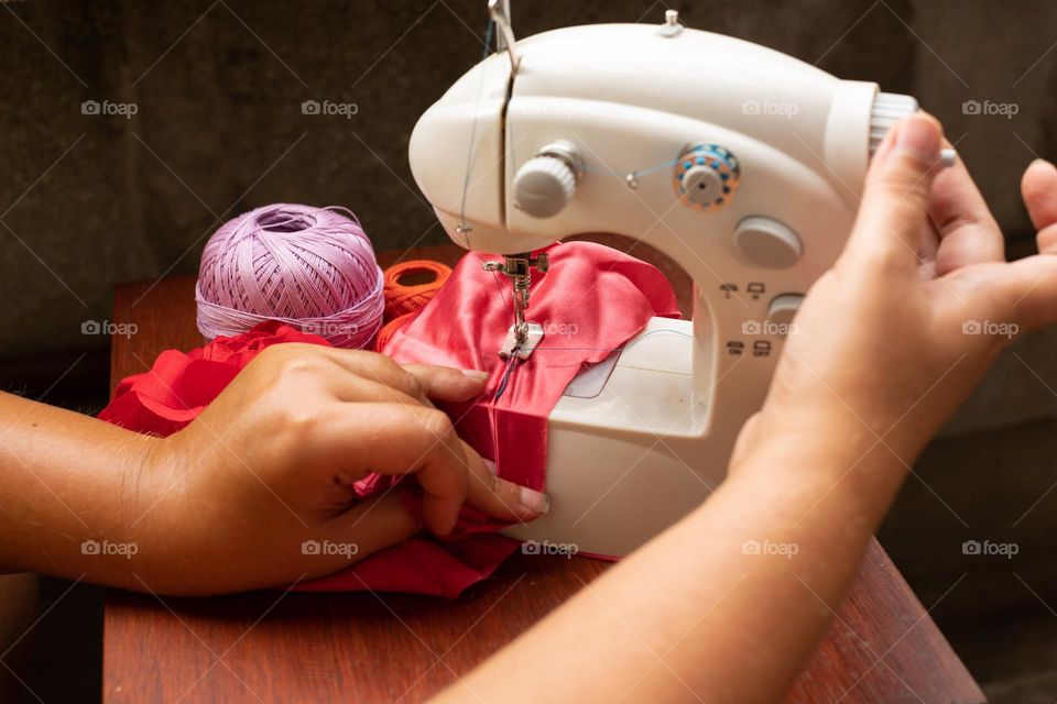 Working at the sewing machine
