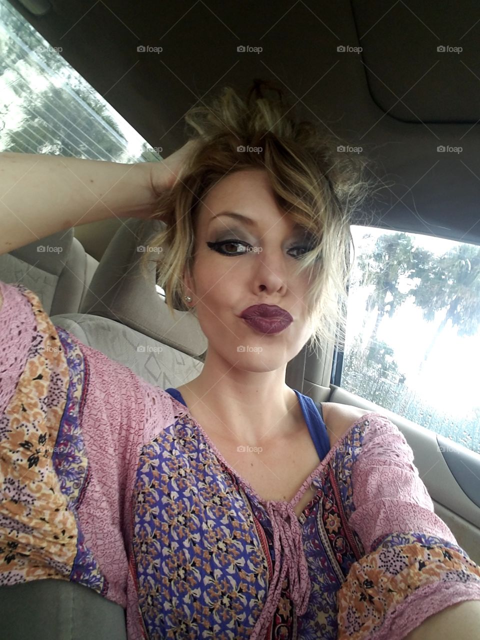 duck face selfie featuring messy bun 😄