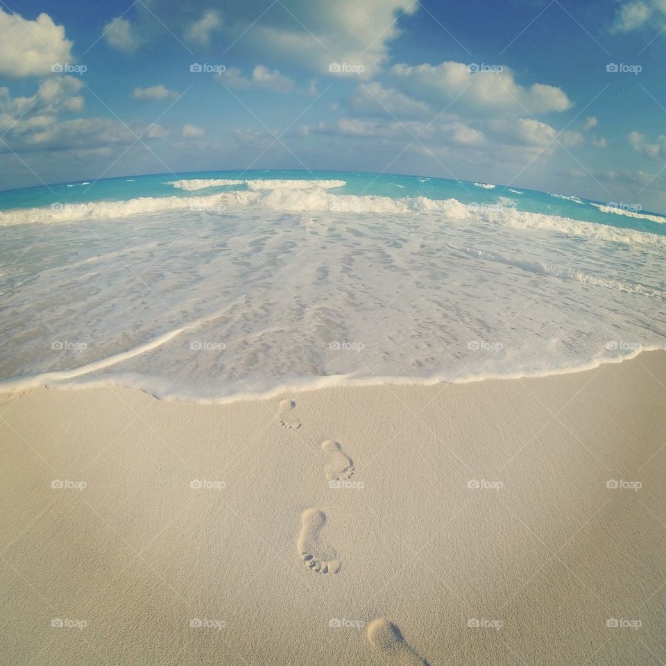 Human footprint on beach