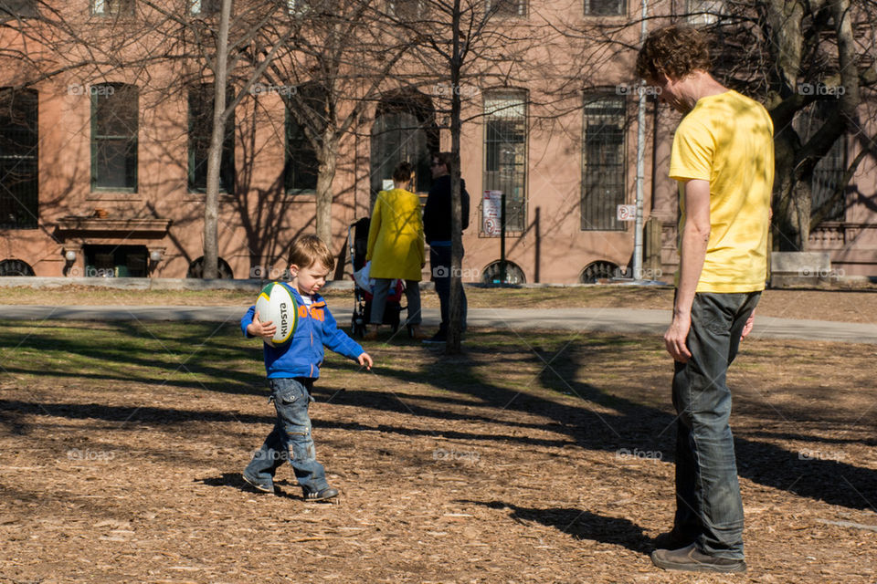 boy playing with father