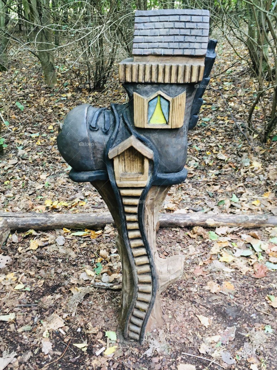 A fairy boot house discovered whilst walking through a fairy village in Kent. I love the trail of steps leading to the fairy door. I wonder if anybody is home...?