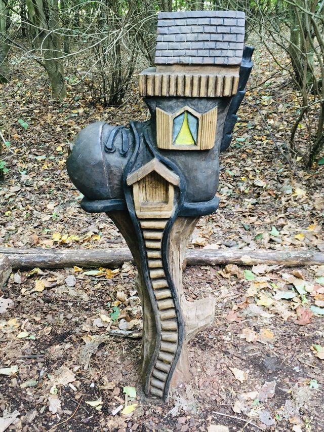A fairy boot house discovered whilst walking through a fairy village in Kent. I love the trail of steps leading to the fairy door. I wonder if anybody is home...?