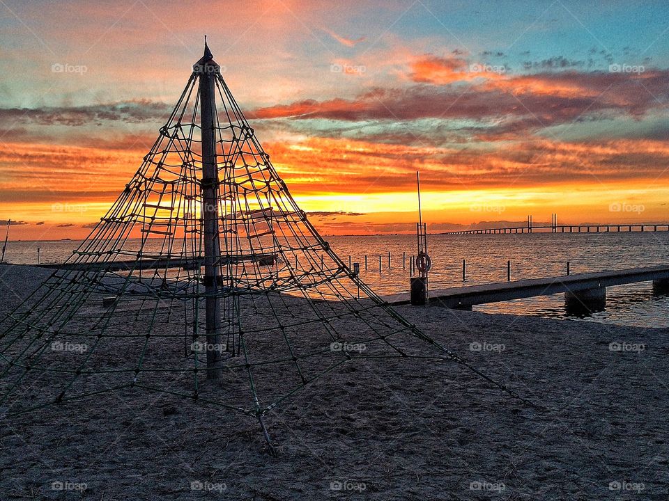 View of fishing net on sandy beach