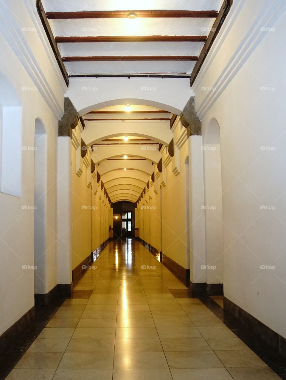 perspective of the wall with many doors