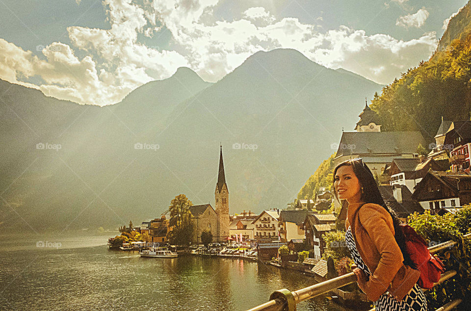 Young woman standing near church