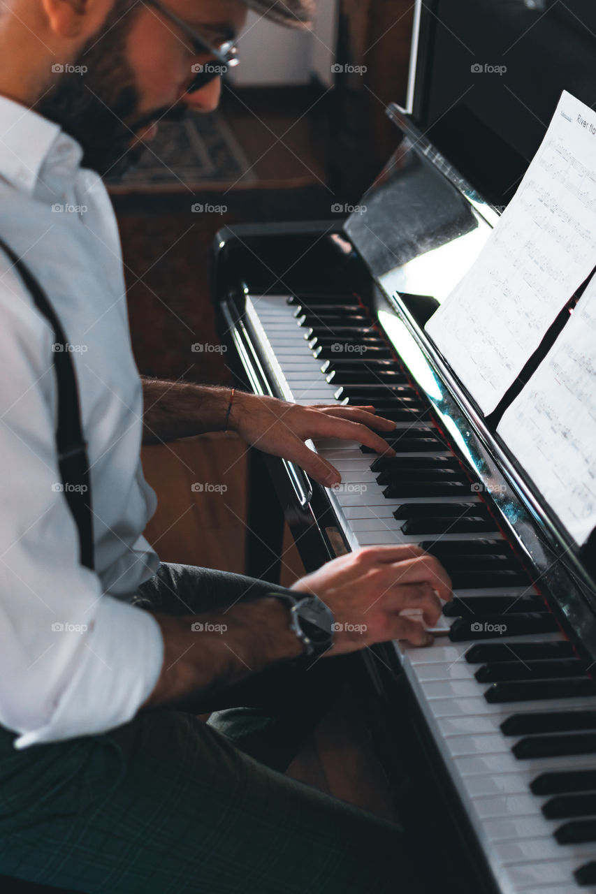 Man playing a piano 