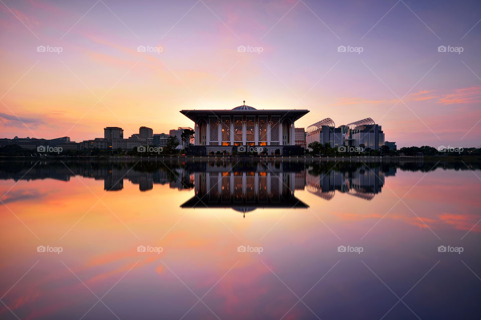 Sunrise reflections over the mosque in Putrajaya Malaysia