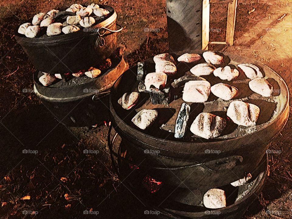 Stylized image of some good old cast iron Dutch ovens. This night we did four different varieties of cobblers - strawberry, lemon, pineapple, and cherry. 