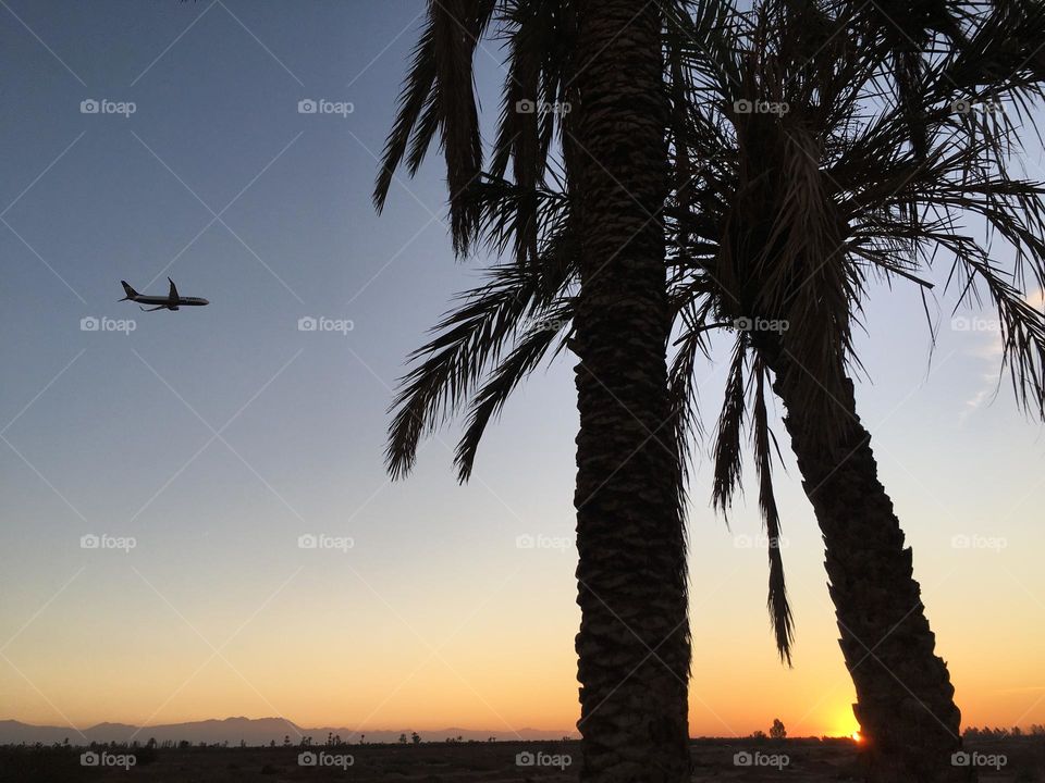 An airplane and beautiful sunset 