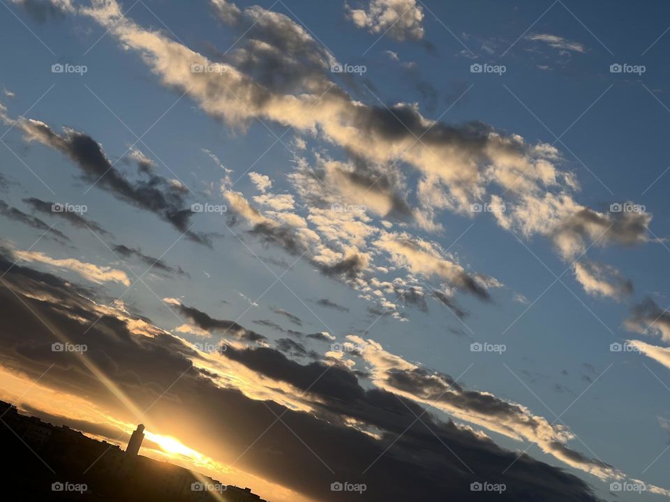 Attractive view of sunset in the midst of clouds