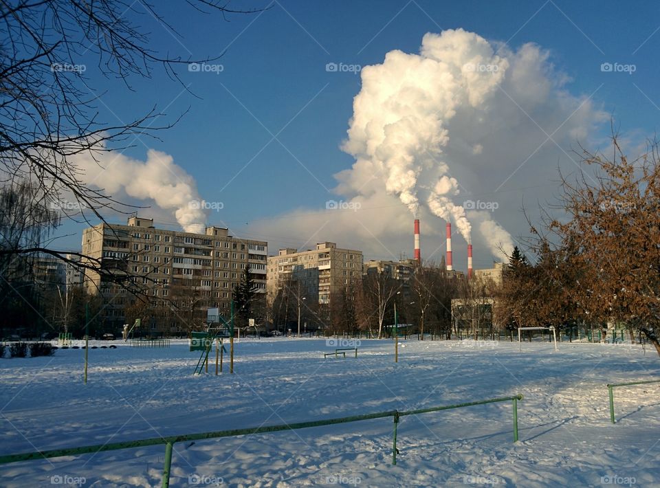 Smoking chimneys in the city